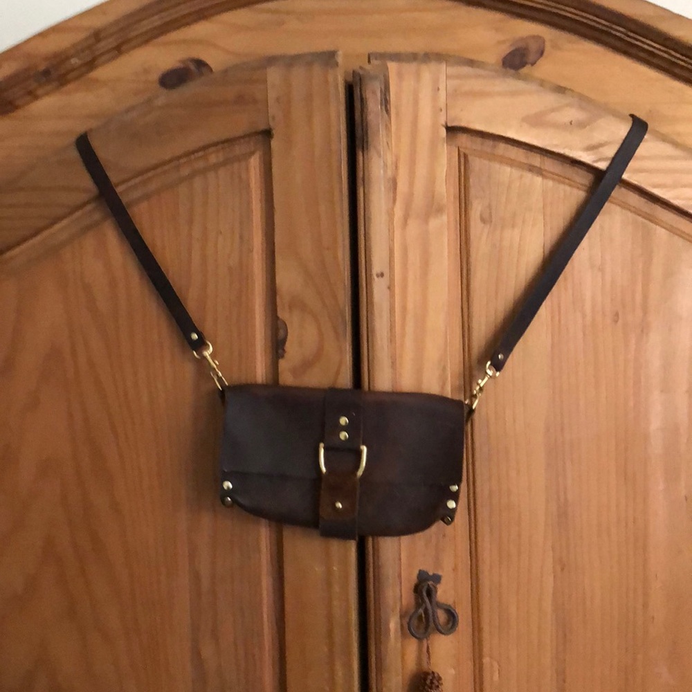 - gorgeous leather crossbody  by Kristy white